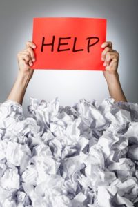A bookkeeper can help you get out from under the piles. A bookkeeper can help you get out from under the piles.